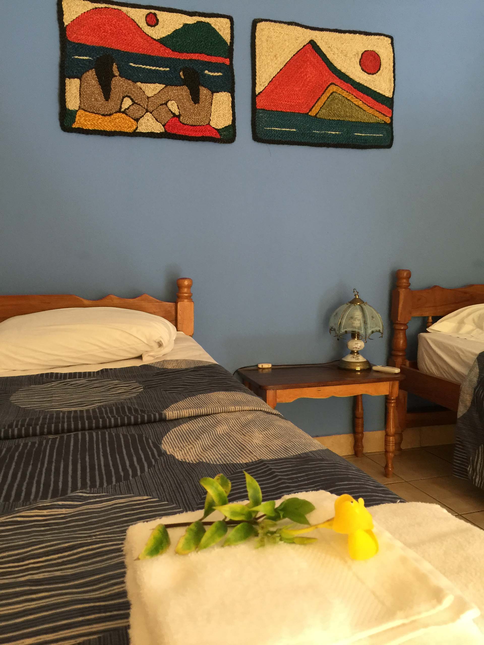 Casa Oro Group El-Pacifico-Hotel-San-Juan-del-Sur-Nicaragua-Talanguera-Budget-Triple-Room-Eco-Flower-on-Bed Hotel Pacifico 